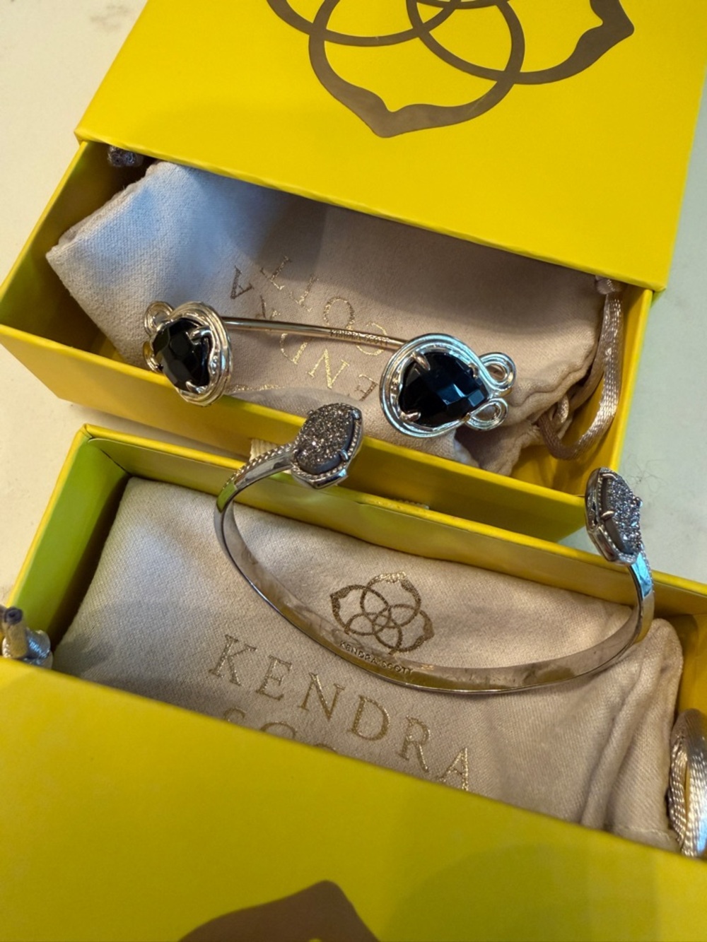 Kendra Scott Cuff Bracelets. Gold with Black Stones. Silver with Dark Sparkling
